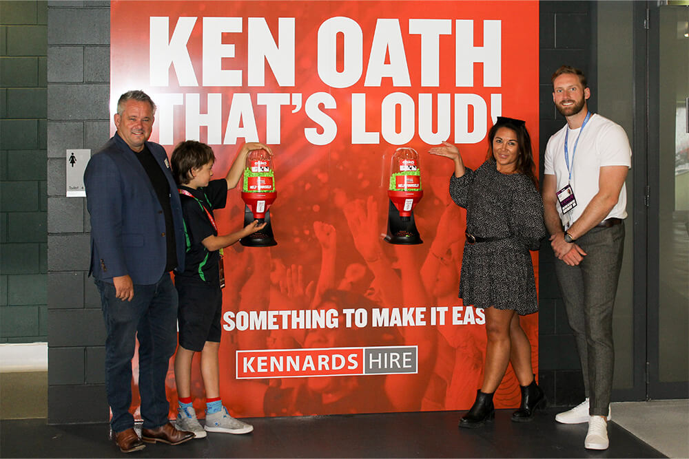 Kennards Hire team members standing next to the Eden Park Sound Senstivity Station