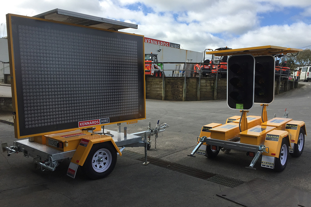 kennards hire electronic board and towable traffic lights stationary at a local branch